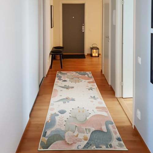 Ambesonne Dinosaur Decorative Rug, Delicate Cartoon Animals of Jurassic Scenario Funny Jungle Pastel Tones, Quality Carpet for Bedroom Dorm and Living Room, 2' 5" x 7' 5", Blush Blue Grey White