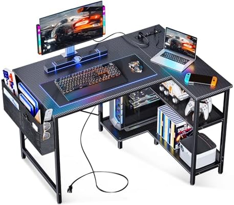 ODK 40 Inch Small L Shaped Gaming Computer Desk with Power Outlets, Corner Desk with Reversible Storage Shelves & PC Stand for Small Space, Modern Simple Home Office Table, Carbon Fiber Surface, Black
