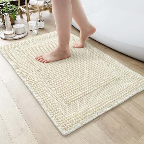 AMOAMI Waffle Bath-Mat, Absorbent Bath Mats for Bathroom Non Slip, Machine Washable Bathroom Rugs with Tassels Ultra Soft Boho Bath Rugs for Floor 17"x24" Cream