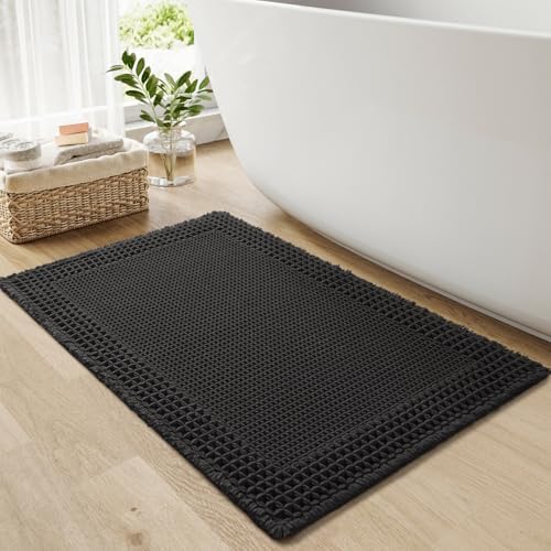RESARE Waffle Bath Mat for Bathroom, Super Absorbent Bathroom Rugs Non Slip Machine Washable, Ultra Soft Quick Dry Boho Bath Rugs with Tassels for Floor, Upgraded Bordered Design, 17"x24" Black