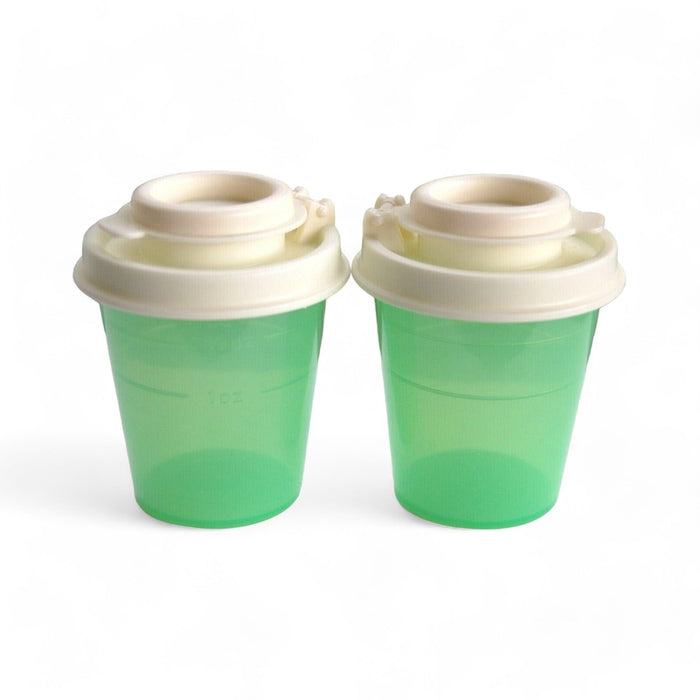 Tupperware Mini Salt & Pepper Shaker Set 2oz Pastel Green with Ivory Tops